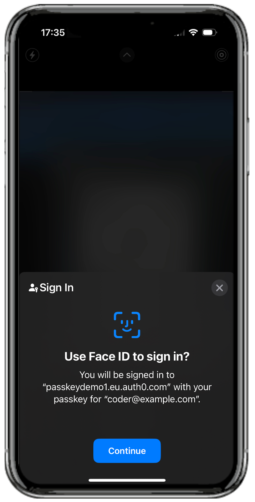 A smartphone screen displays a Face ID sign-in prompt for user authentication. 