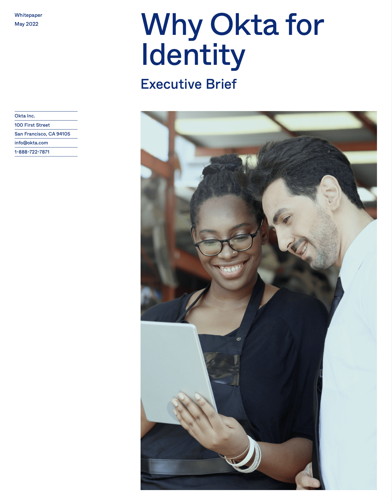 Why Okta for Identity cover image - a woman and a man look at a tablet computer