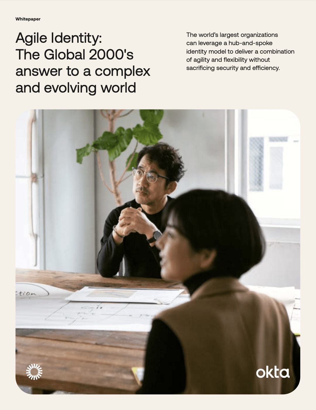 Agile Identity Whitepaper Cover Image featuring a man and woman sat at a table